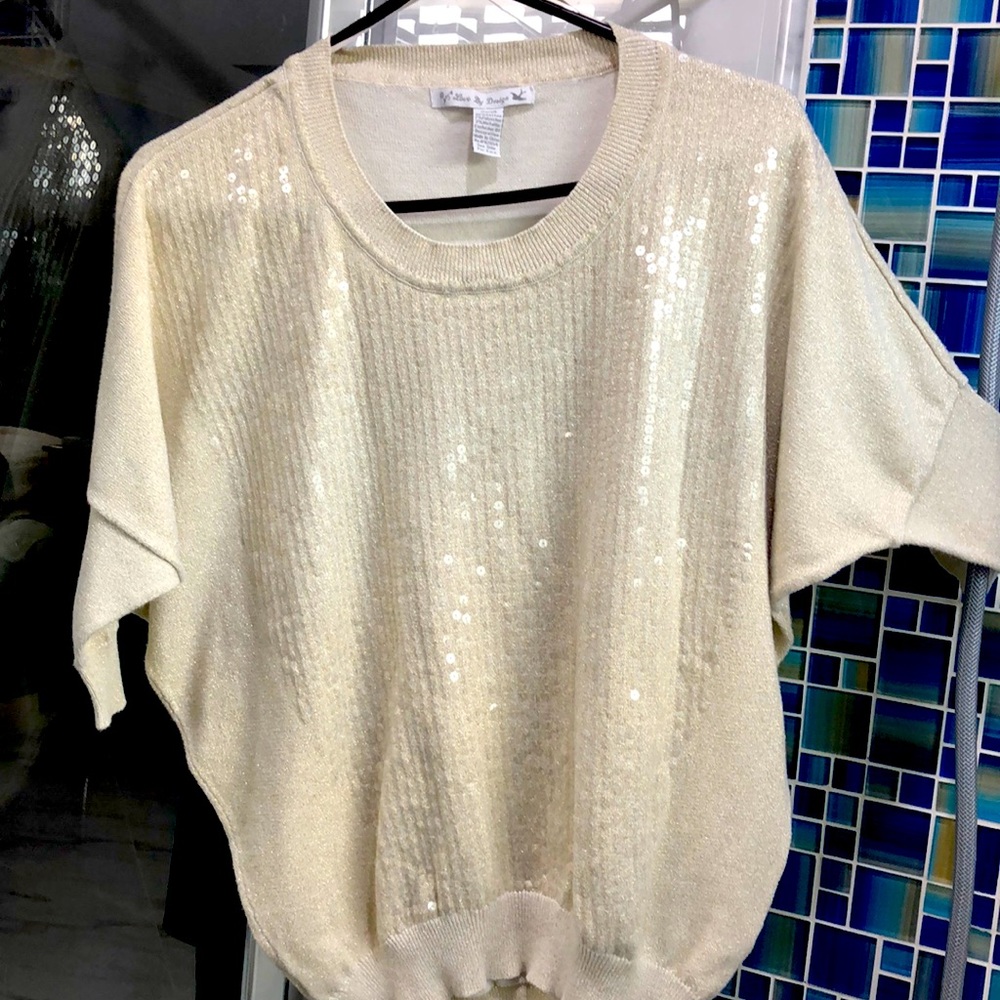 Beautiful!! Champagne colored sparkly sweater